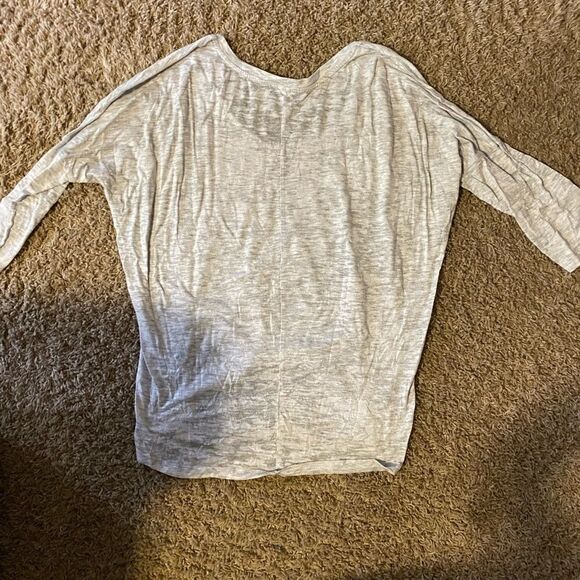 This loose 3/4 sleeve shirt is a size S/M - Picture 2 of 3